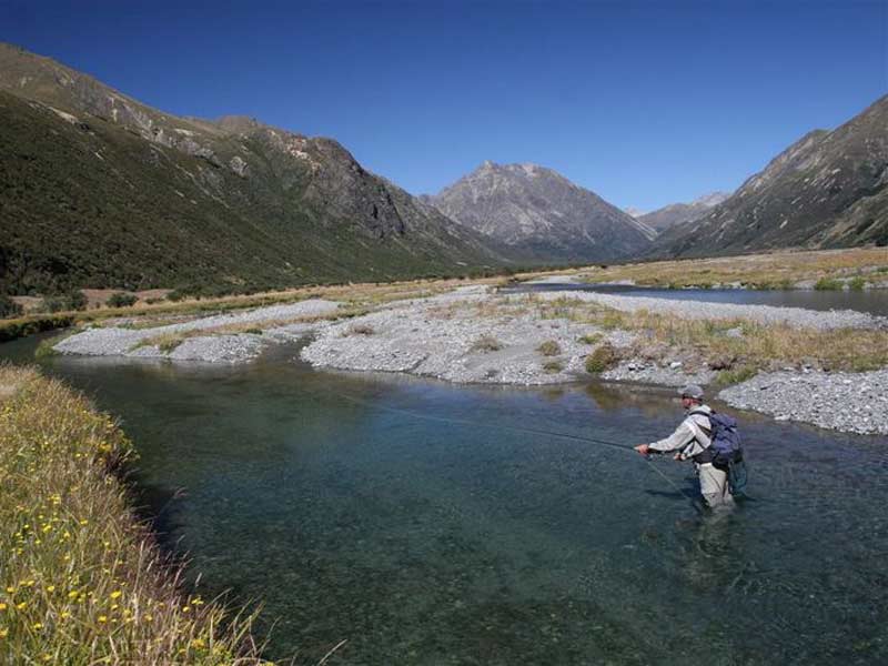 Casting for trout in the river
